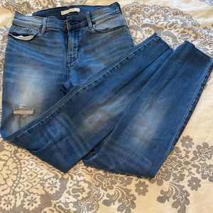 Ripped Ankle Skinny Jeans